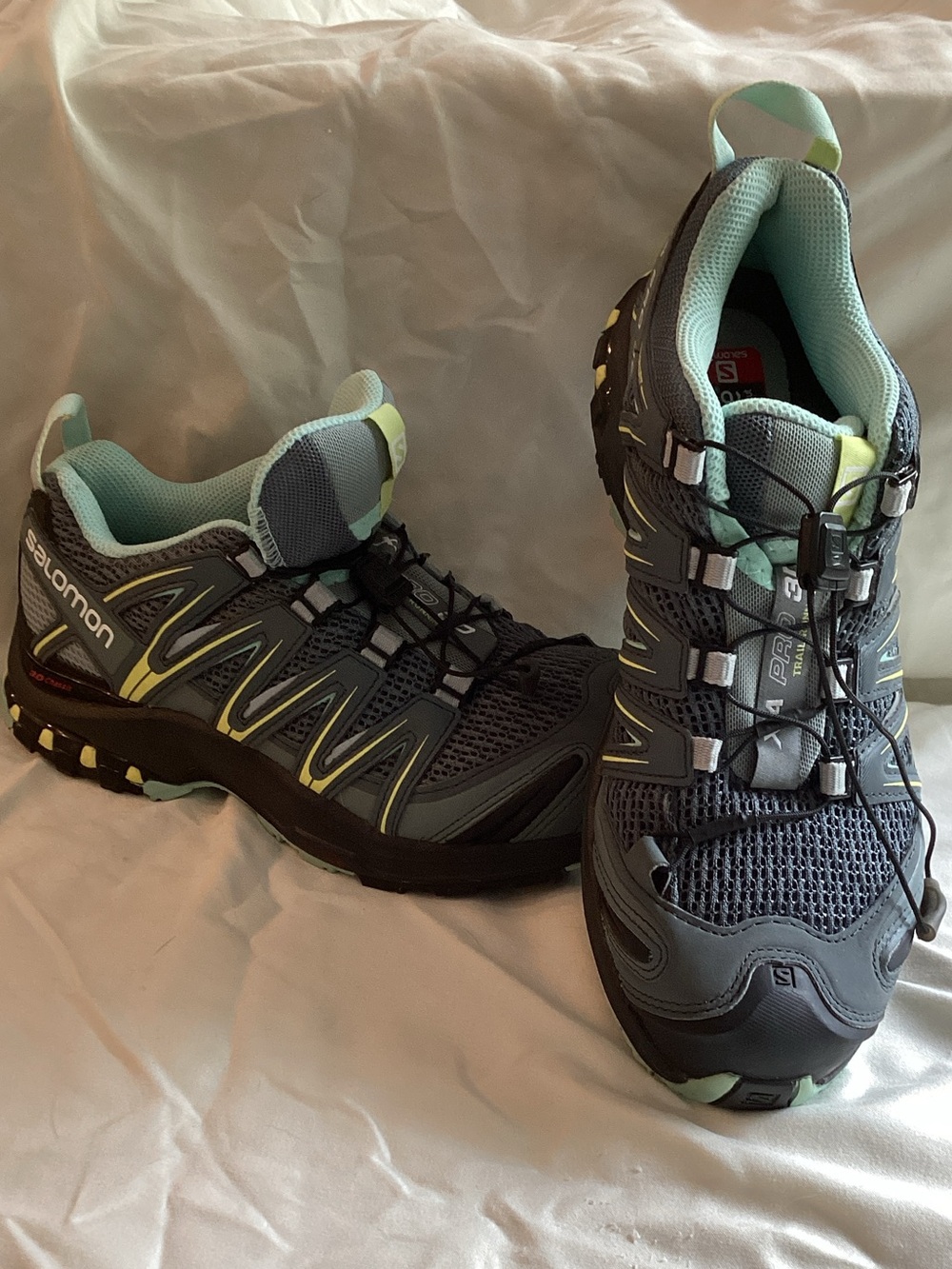 Salomon Women’s Gray Trail Runners with Mint Accents